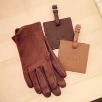 Leather gloves and luggage tags with matching imprinted logos.
